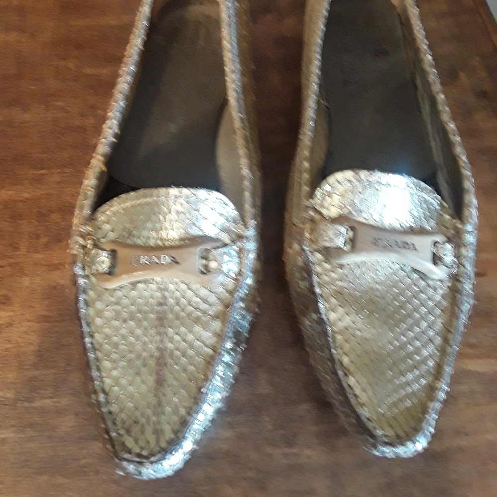 Prada Embossed pointed Toe loafers.